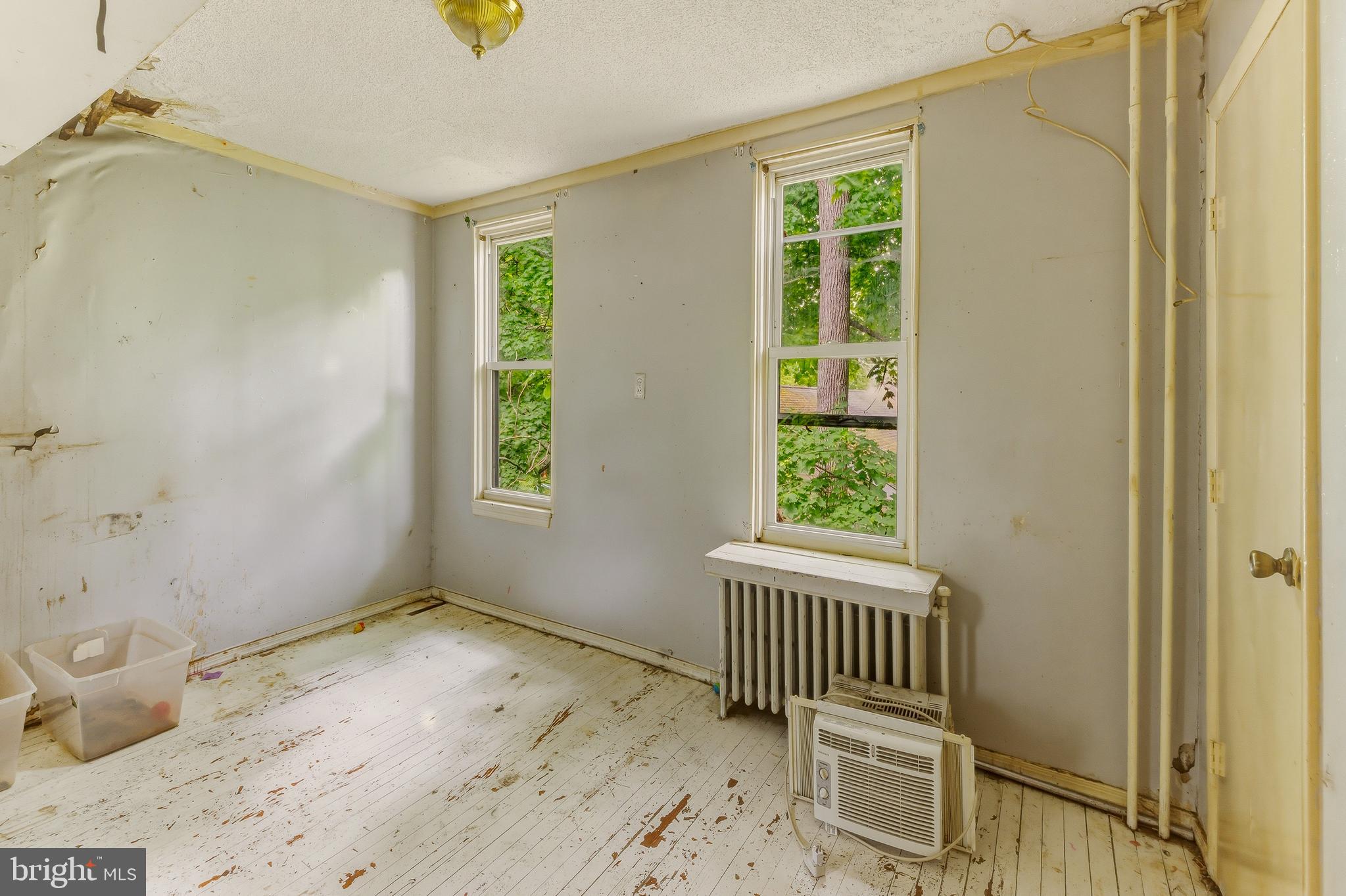 246 Rutland Avenue Mount Holly, NJ 08060 - Photo 15 of 18 a view of a bedroom with a window
