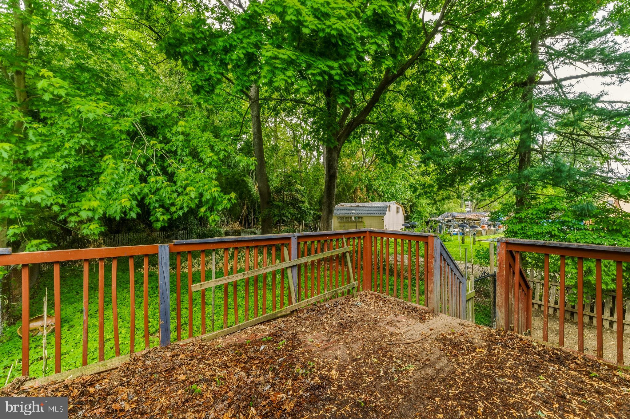 246 Rutland Avenue Mount Holly, NJ 08060 - Photo 18 of 18 a view of balcony with wooden floor and fence