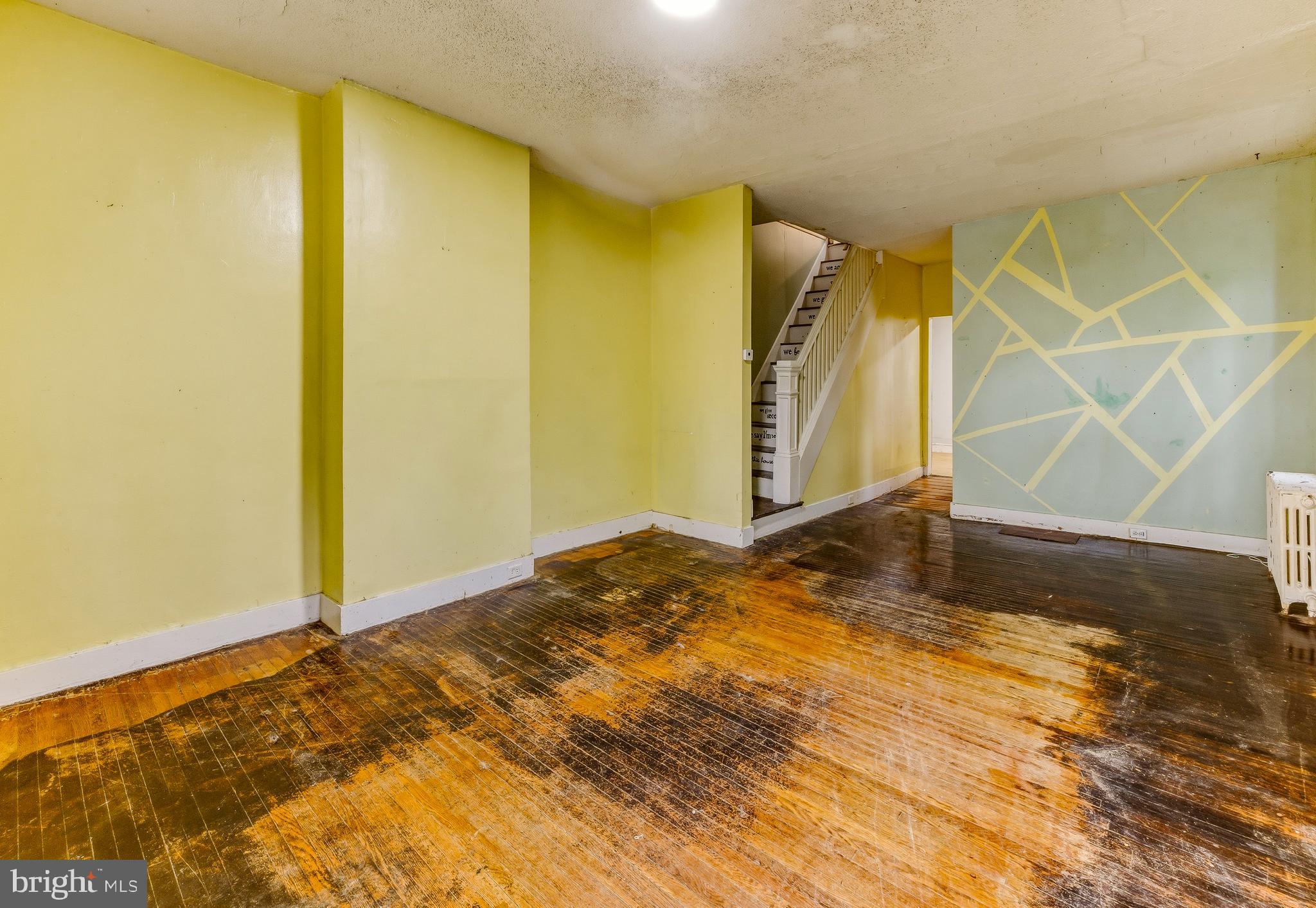 246 Rutland Avenue Mount Holly, NJ 08060 - Photo 2 of 18 a view of a room with a dresser and wooden floor