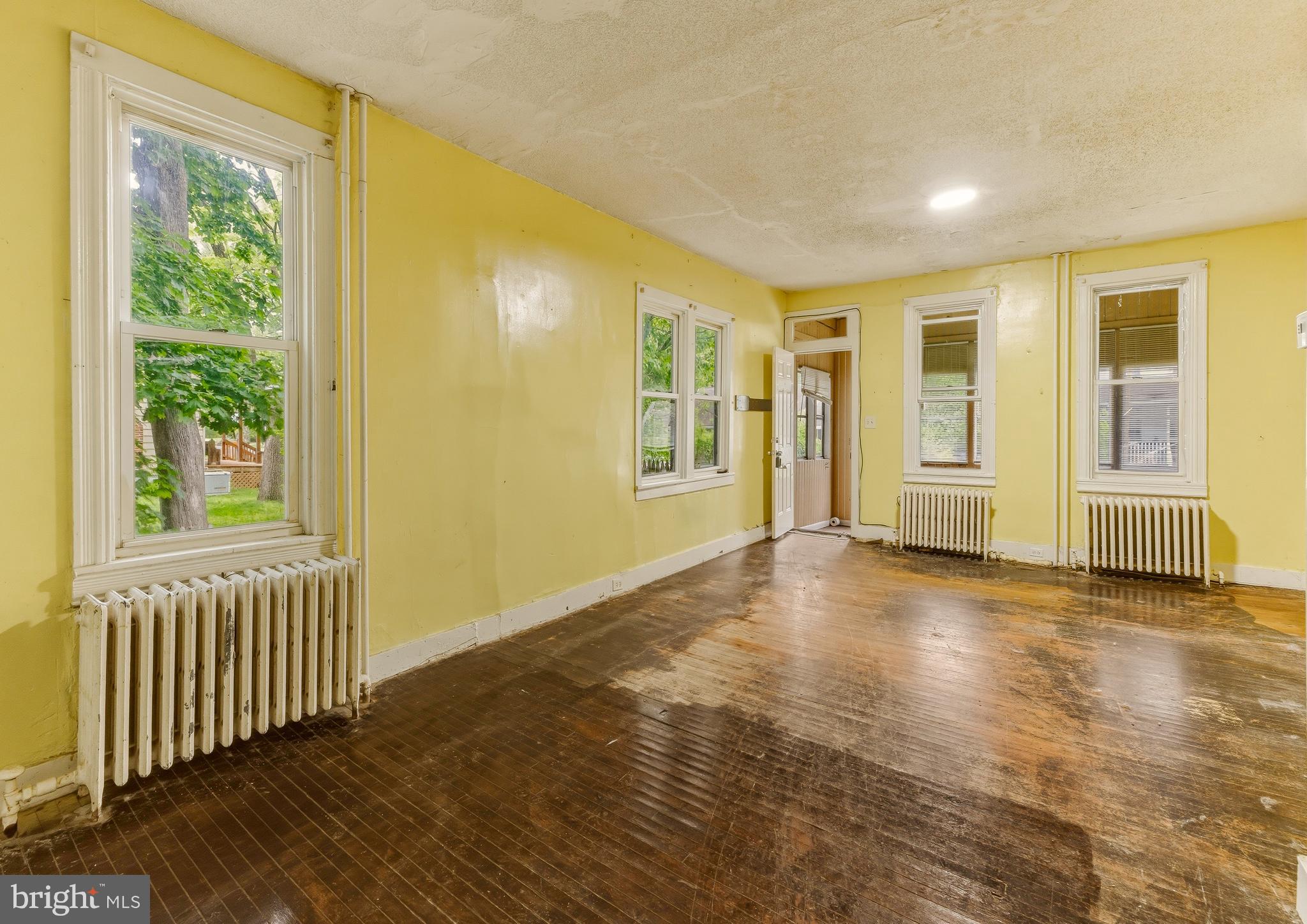246 Rutland Avenue Mount Holly, NJ 08060 - Photo 4 of 18 a view of an empty room with a window