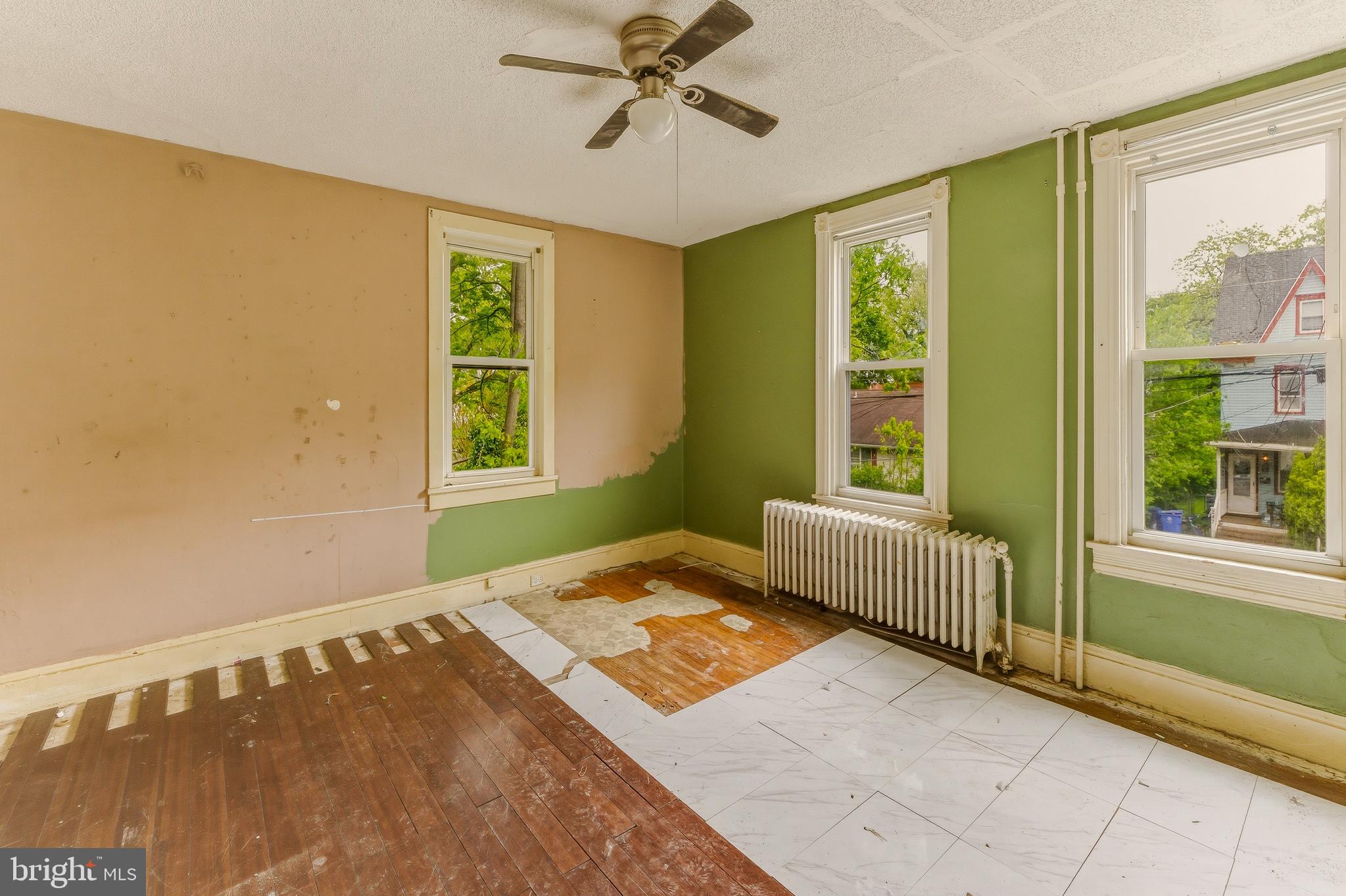 246 Rutland Avenue Mount Holly, NJ 08060 - Photo 10 of 18 a bedroom with a bed and a window