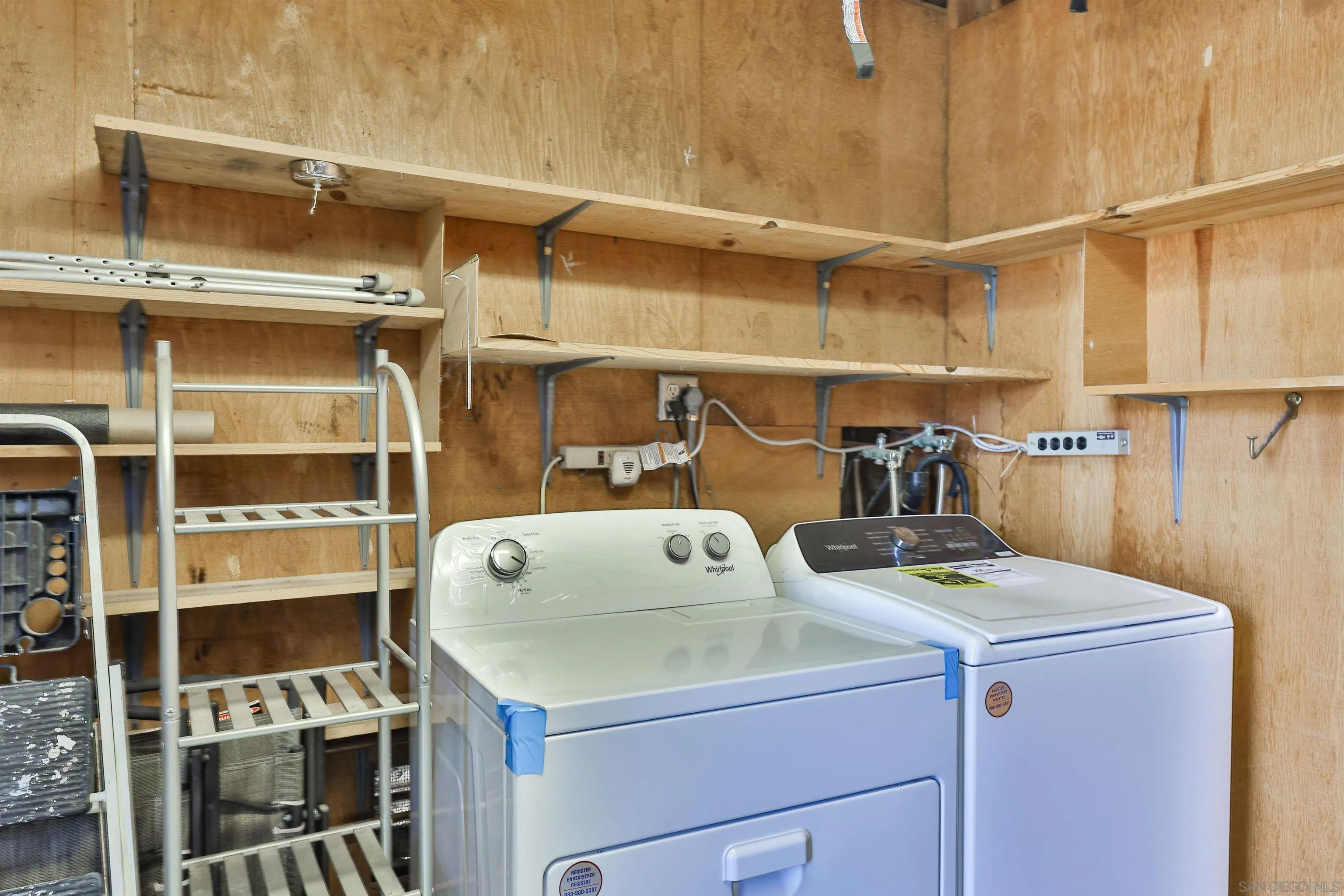 1732 Belle Meade Road Encinitas, CA 92024 - Photo 27 of 37 a utility room with dryer and washer