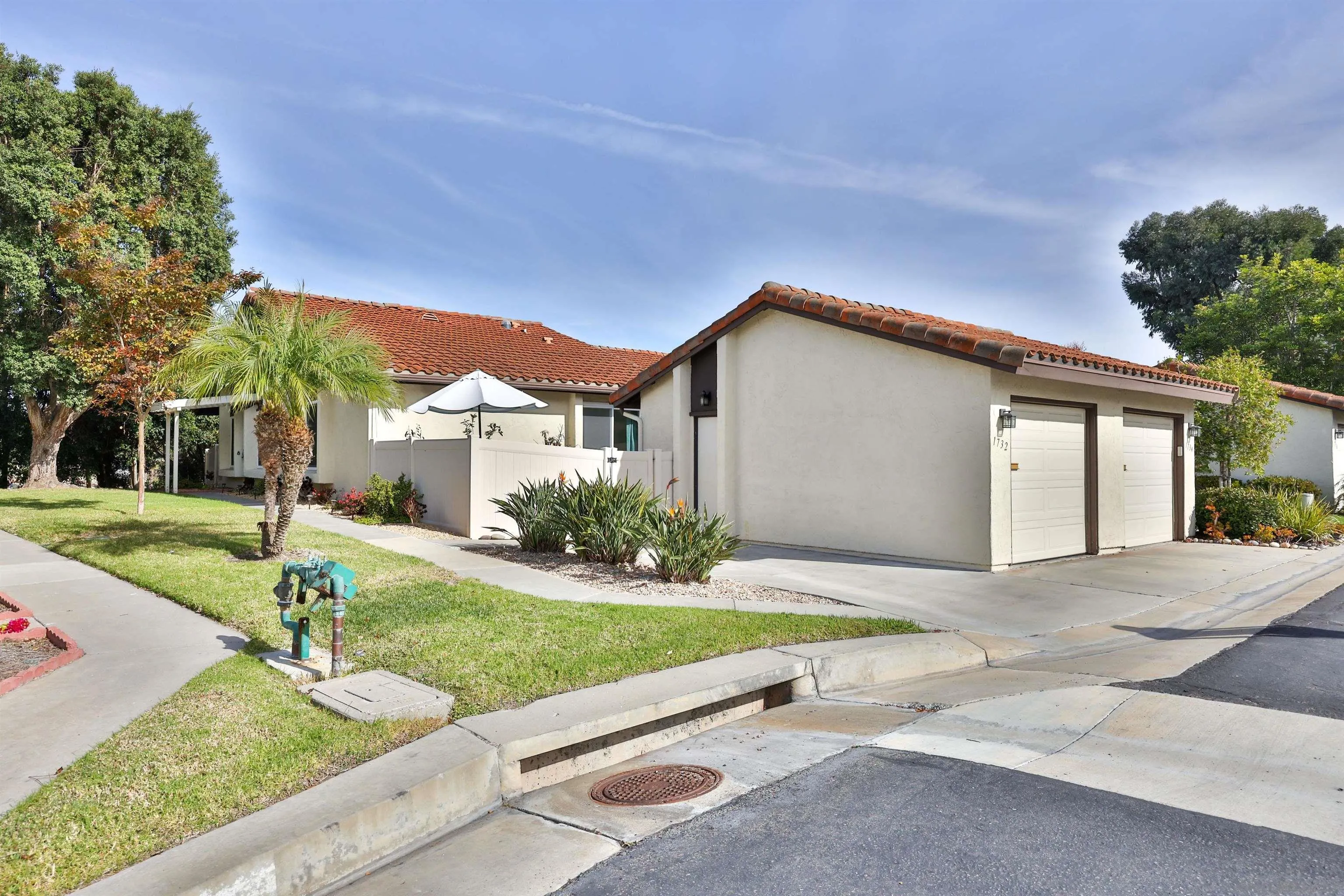 1732 Belle Meade Road Encinitas, CA 92024 - Photo 3 of 37 a front view of house with yard and green space