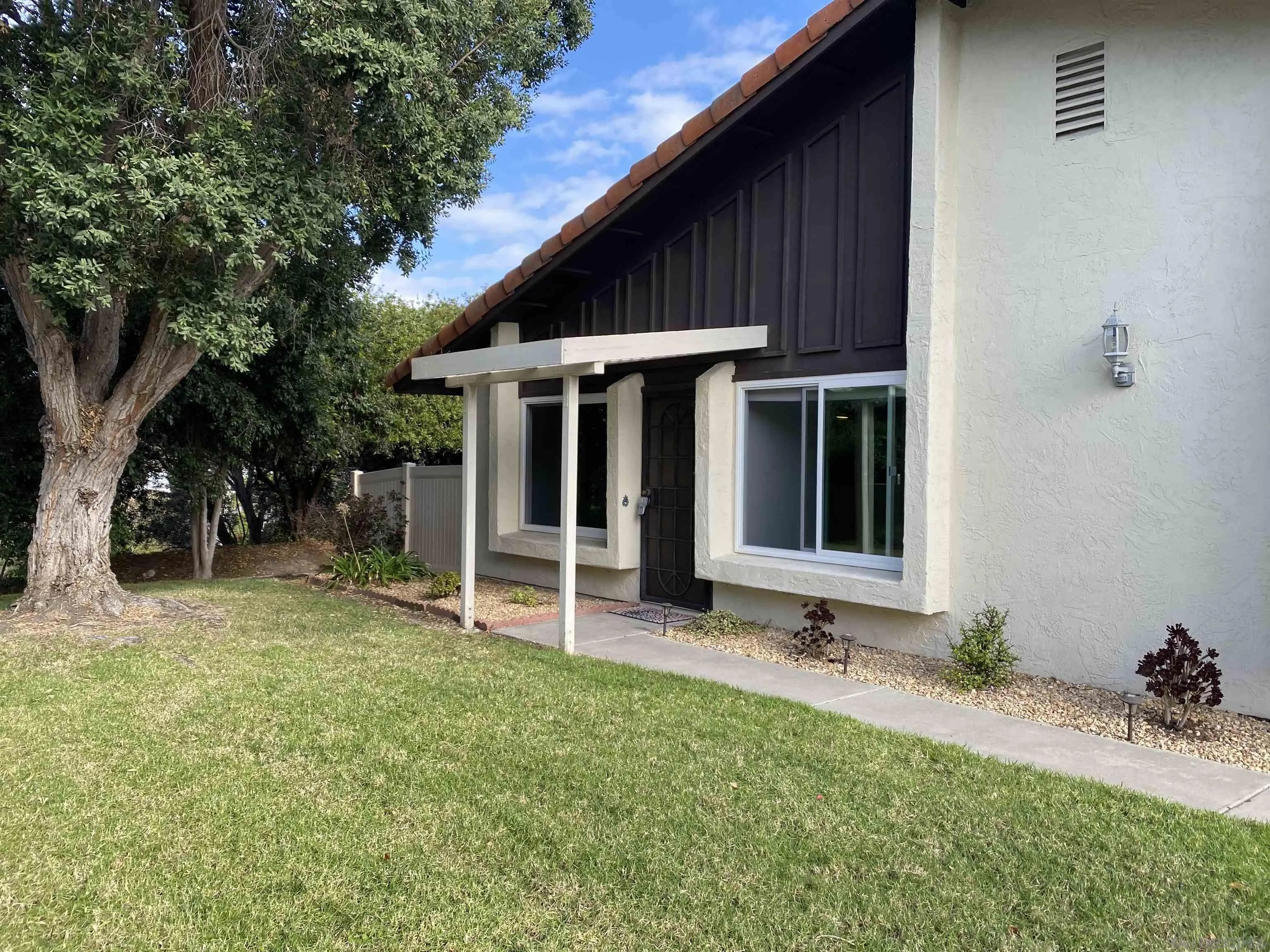 1732 Belle Meade Road Encinitas, CA 92024 - Photo 4 of 37 a view of a house with a yard and tree