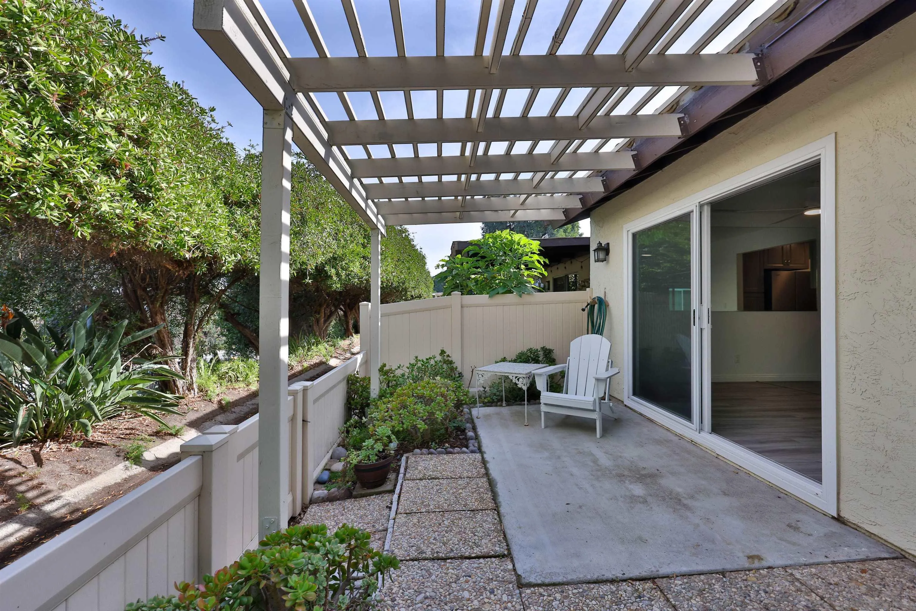 1732 Belle Meade Road Encinitas, CA 92024 - Photo 8 of 37 a view of a patio with table and chairs with plants