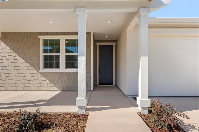 a view of a entryway door front of house