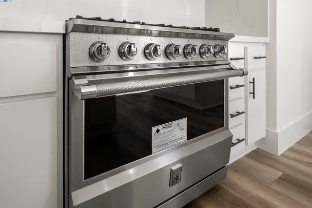 a close view of a stove and microwave