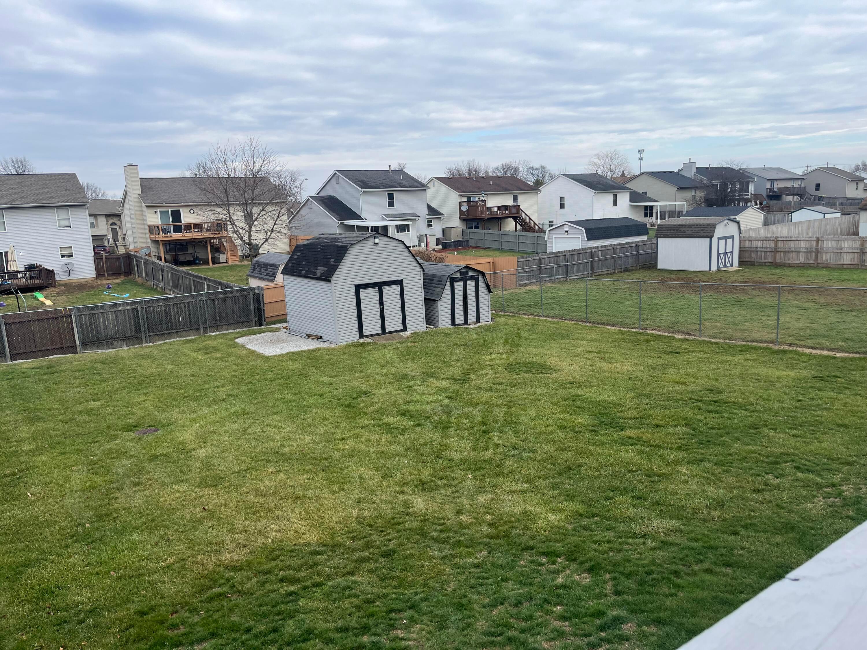 1174 Obetz Road Columbus, OH 43207 - Photo 35 of 41 Large yard with three outdoor buildings.