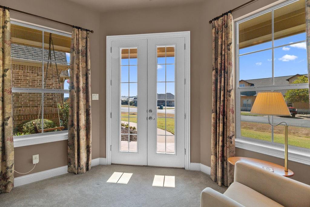 117 Citation Drive Cresson, TX 76035 - Photo 27 of 40 Doorway with french doors and carpet flooring