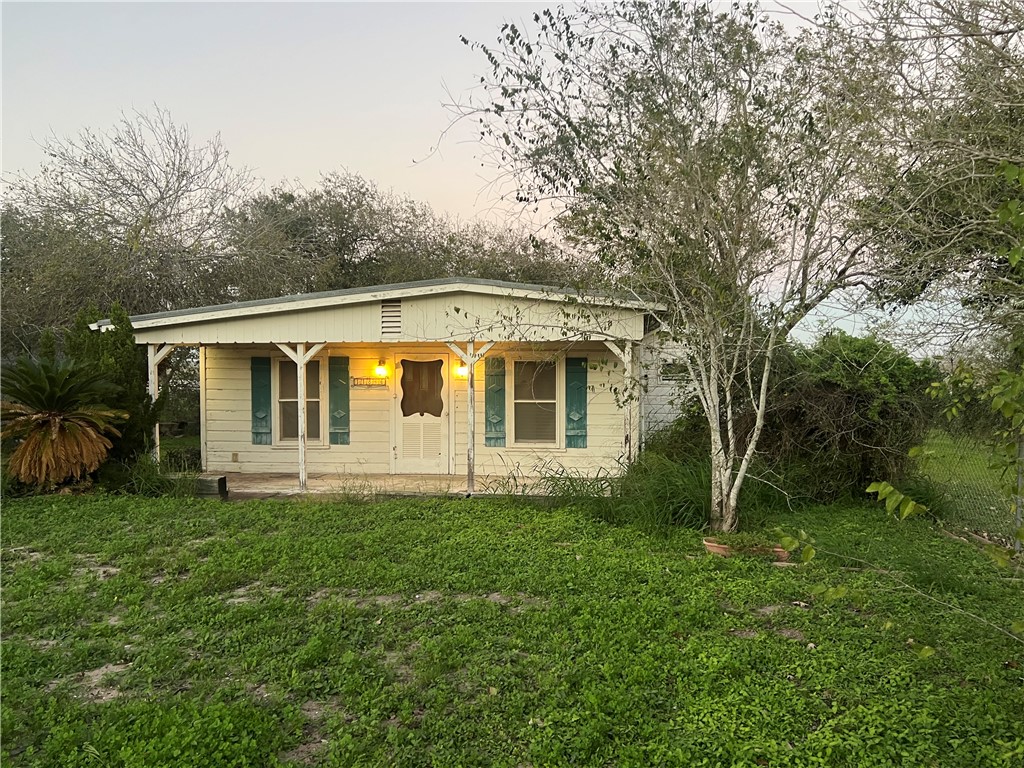 11846 Up River Road Corpus Christi, TX 78410 - Photo 2 of 4 a view of a house with a yard