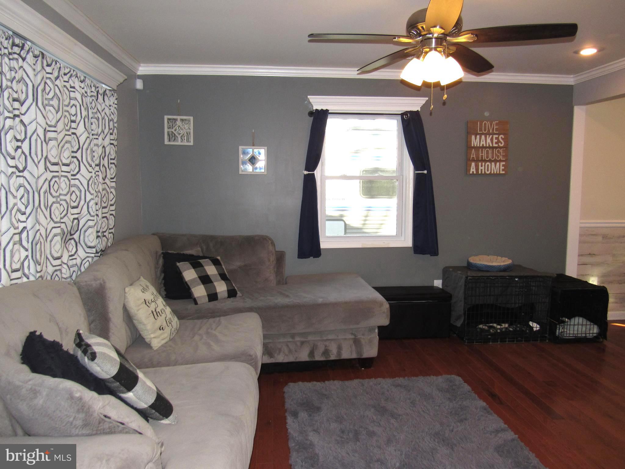 1165 Steamboat Road Shady Side, MD 20764 - Photo 19 of 51 Living room has ceiling fan w/light attachment