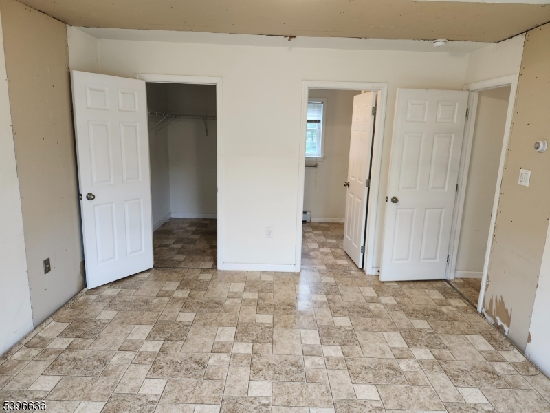 128 Big Piece Road Fairfield, NJ 07004 - Photo 15 of 22 a view of a bathroom with a sink