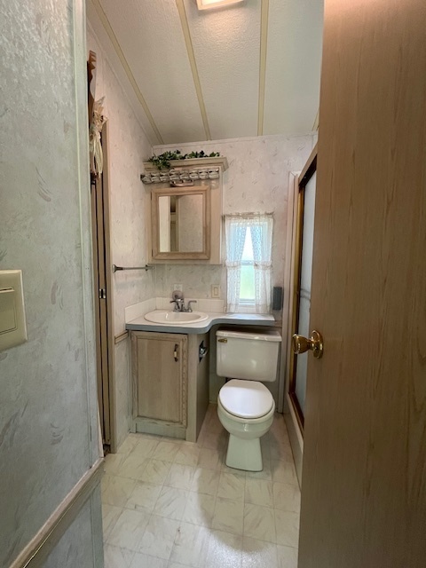 2795 East 28th Road Marseilles, IL 61341 - Photo 17 of 59 a bathroom with a granite countertop sink toilet and shower