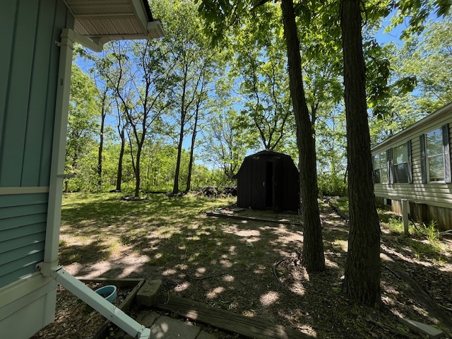 2795 East 28th Road Marseilles, IL 61341 - Photo 19 of 59 a backyard of a house with lots of green space