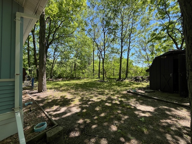 2795 East 28th Road Marseilles, IL 61341 - Photo 20 of 59 a backyard of a house with lots of green space