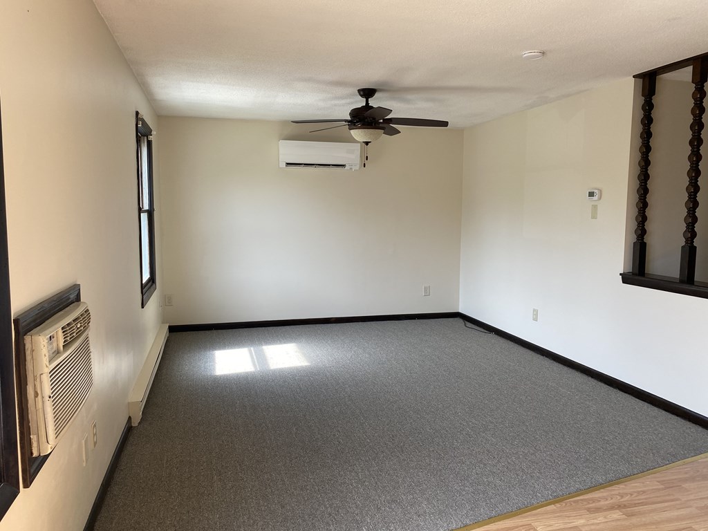 218-220 Centre Street Springfield, MA 01151 - Photo 21 of 27 an empty room with windows