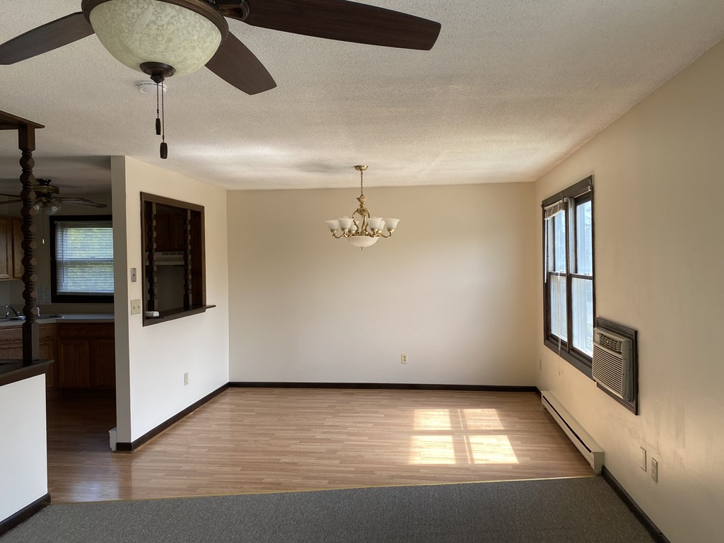 218-220 Centre Street Springfield, MA 01151 - Photo 22 of 27 a view of an empty room with a window