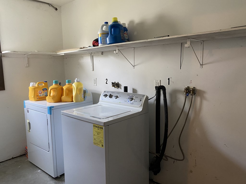 218-220 Centre Street Springfield, MA 01151 - Photo 27 of 27 a utility room with dryer and washer
