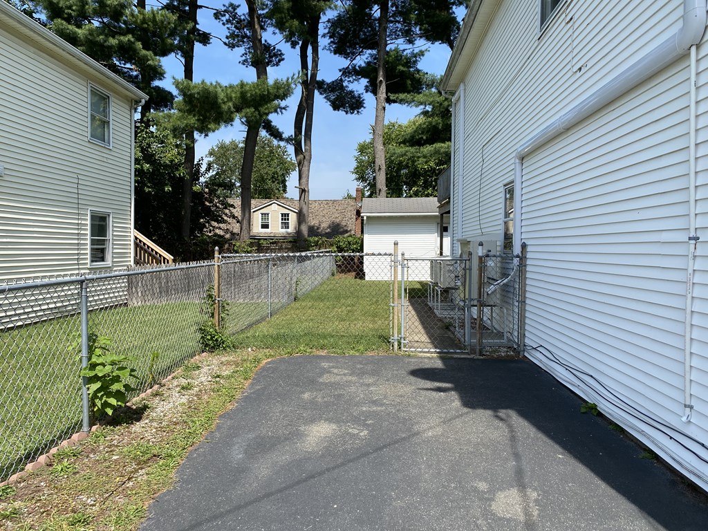 218-220 Centre Street Springfield, MA 01151 - Photo 4 of 27 a view of a house with backyard and sitting area