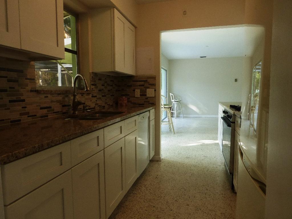 1607 High Ridge Road Lake Worth, FL 33461 - Photo 43 of 45 Kitchen leads to Dining Area