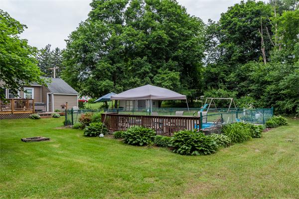 622 Amostown Road West Springfield, MA 01089 - Photo 3 of 30 a view of a garden with a plants and trees