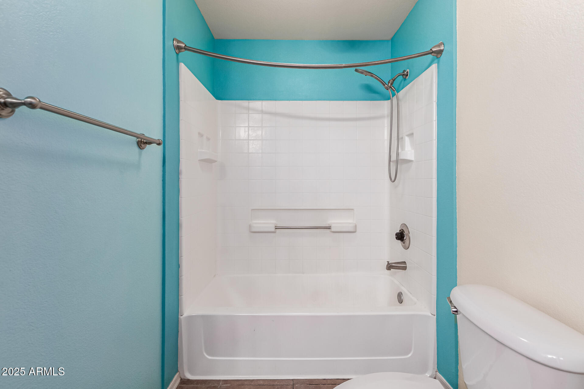 3302 North 7th Street, Unit 225 Phoenix, AZ 85014 - Photo 16 of 23 a bathroom with a shower and a toilet
