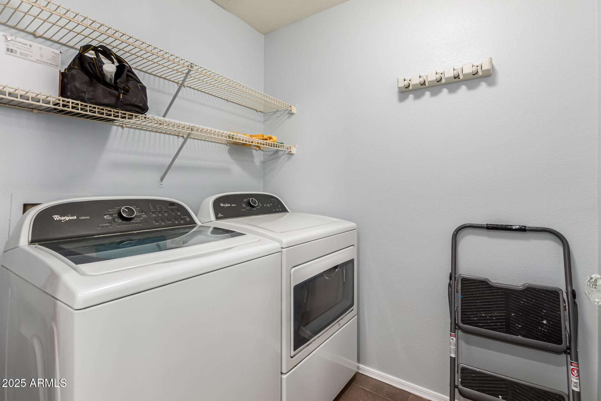 3302 North 7th Street, Unit 225 Phoenix, AZ 85014 - Photo 17 of 23 a utility room with dryer and washer