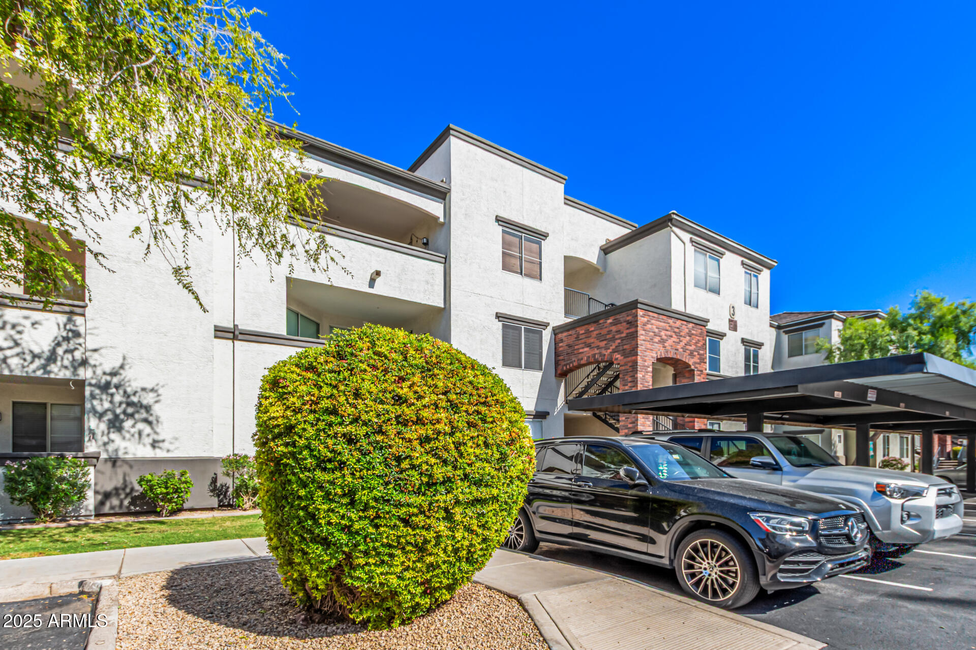 3302 North 7th Street, Unit 225 Phoenix, AZ 85014 - Photo 20 of 23 a car parked in front of a house