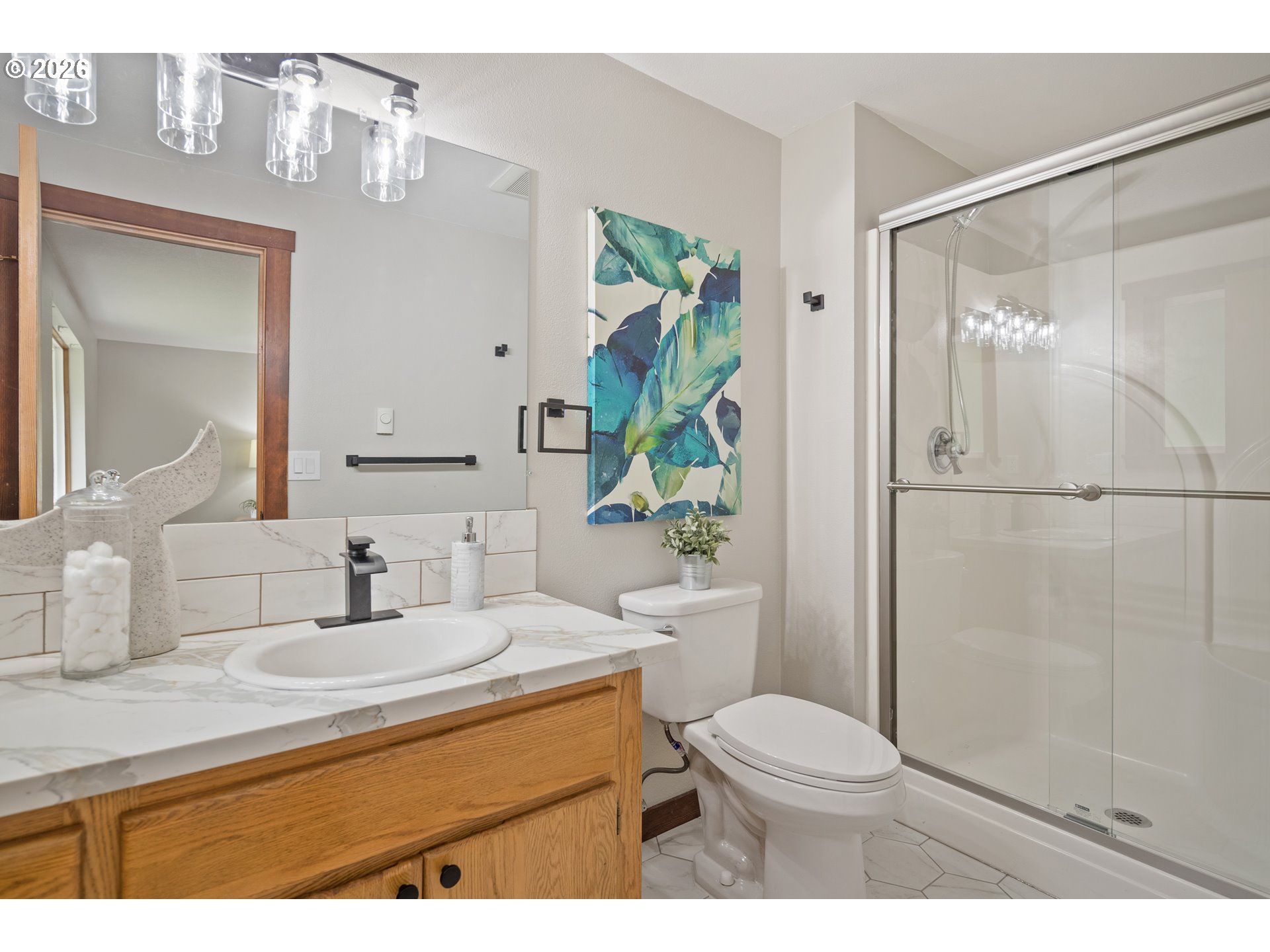 650 Marvin Road Tillamook, OR 97141 - Photo 26 of 48 a bathroom with a sink a toilet and shower
