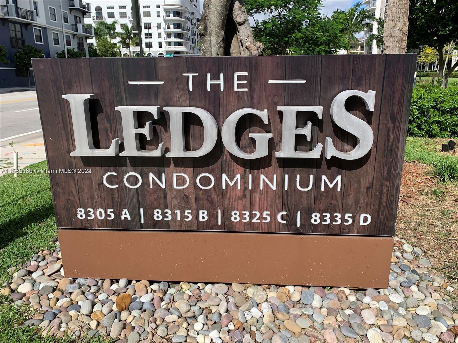 a front of a red sign board