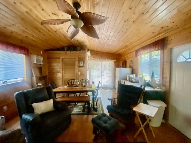 2-131 Woodhaven Sublette, IL 61367 - Photo 22 of 31 a living room with furniture and wooden floor