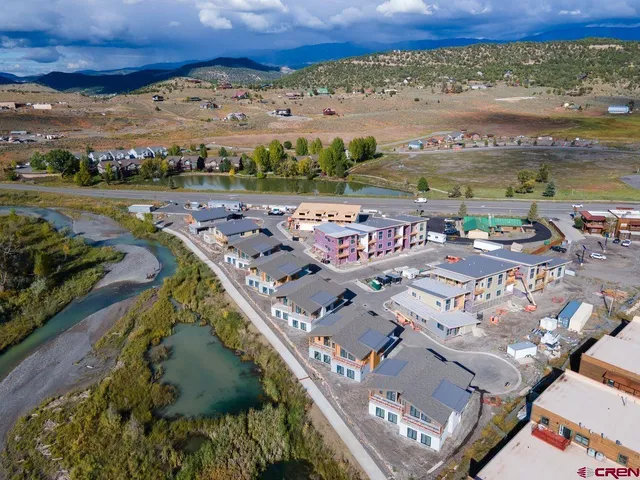 a view of a city with an ocean