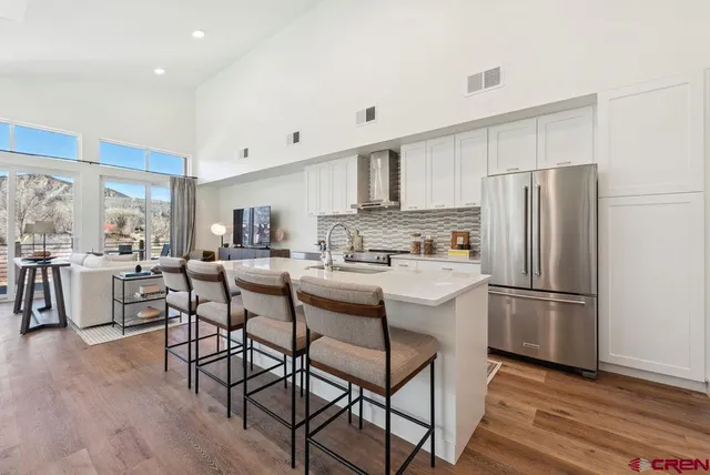 a bedroom with bed and window