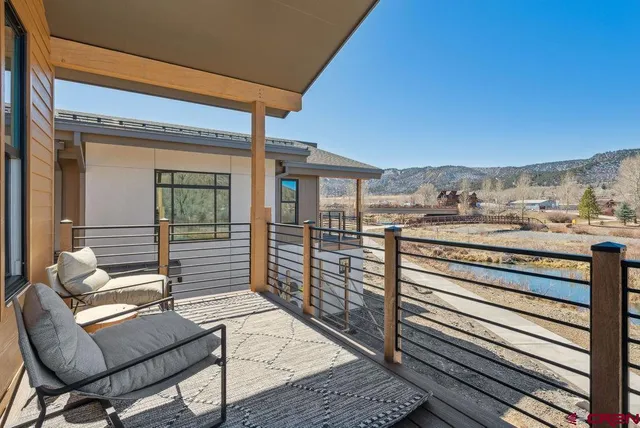 a view of roof deck with patio
