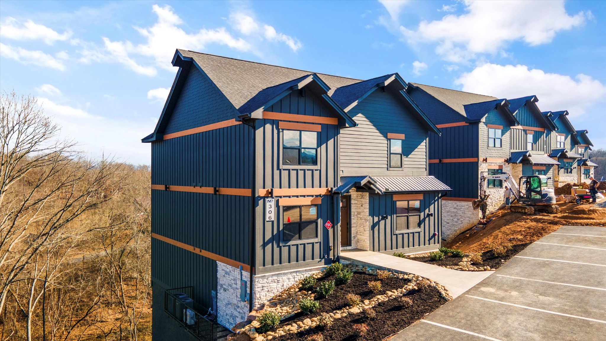 320 Rambling Creek Way Sevierville, TN 37862 - Photo 11 of 65 a front view of a house with balcony