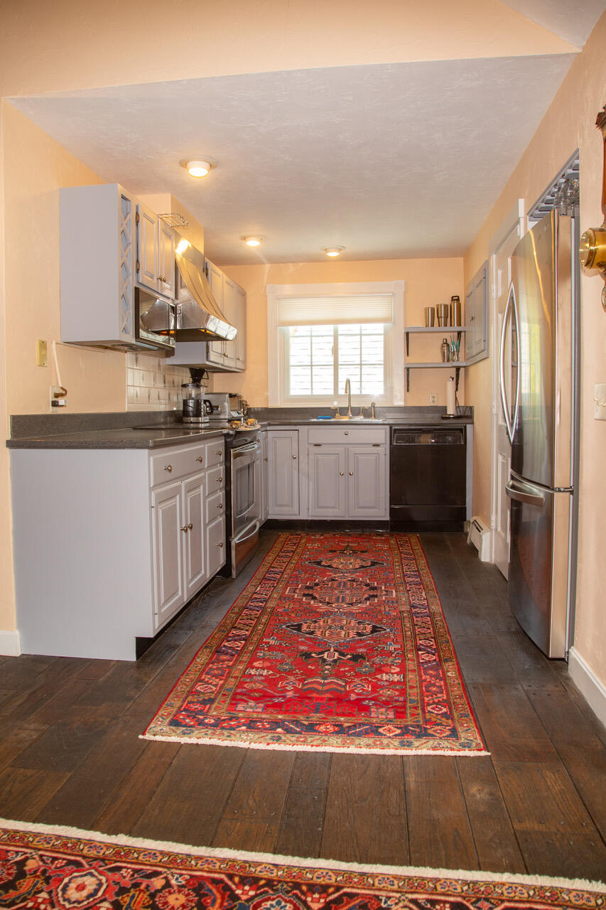 21 Midpine Road Cummaquid, MA 02675 - Photo 15 of 32 a large kitchen with stainless steel appliances granite countertop a refrigerator oven stove a sink and dishwasher