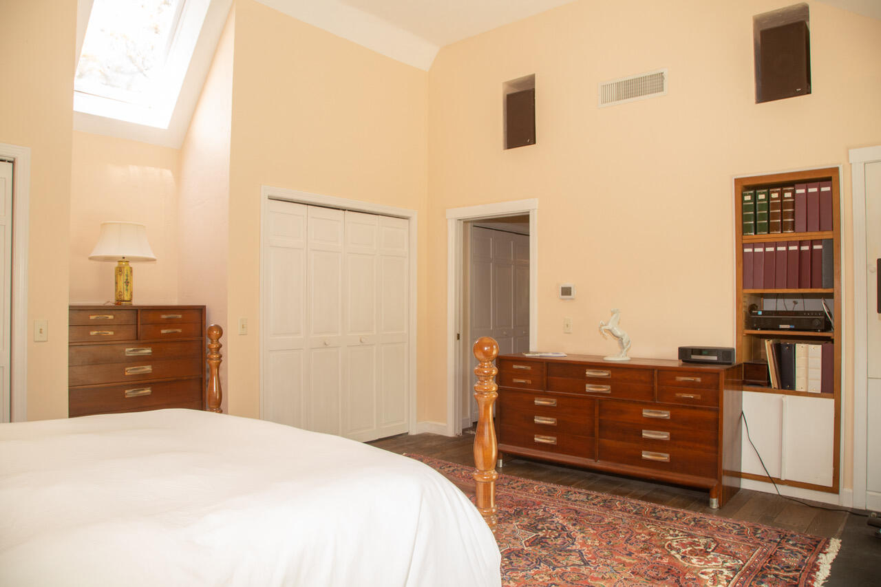 21 Midpine Road Cummaquid, MA 02675 - Photo 19 of 32 a bedroom with a bed and a dresser