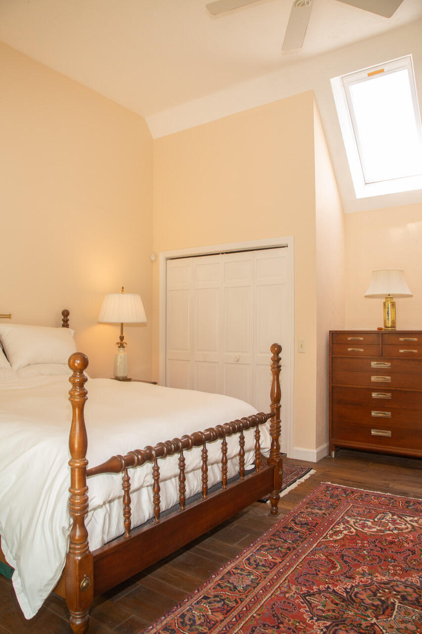 21 Midpine Road Cummaquid, MA 02675 - Photo 20 of 32 a bedroom with a bed and a window