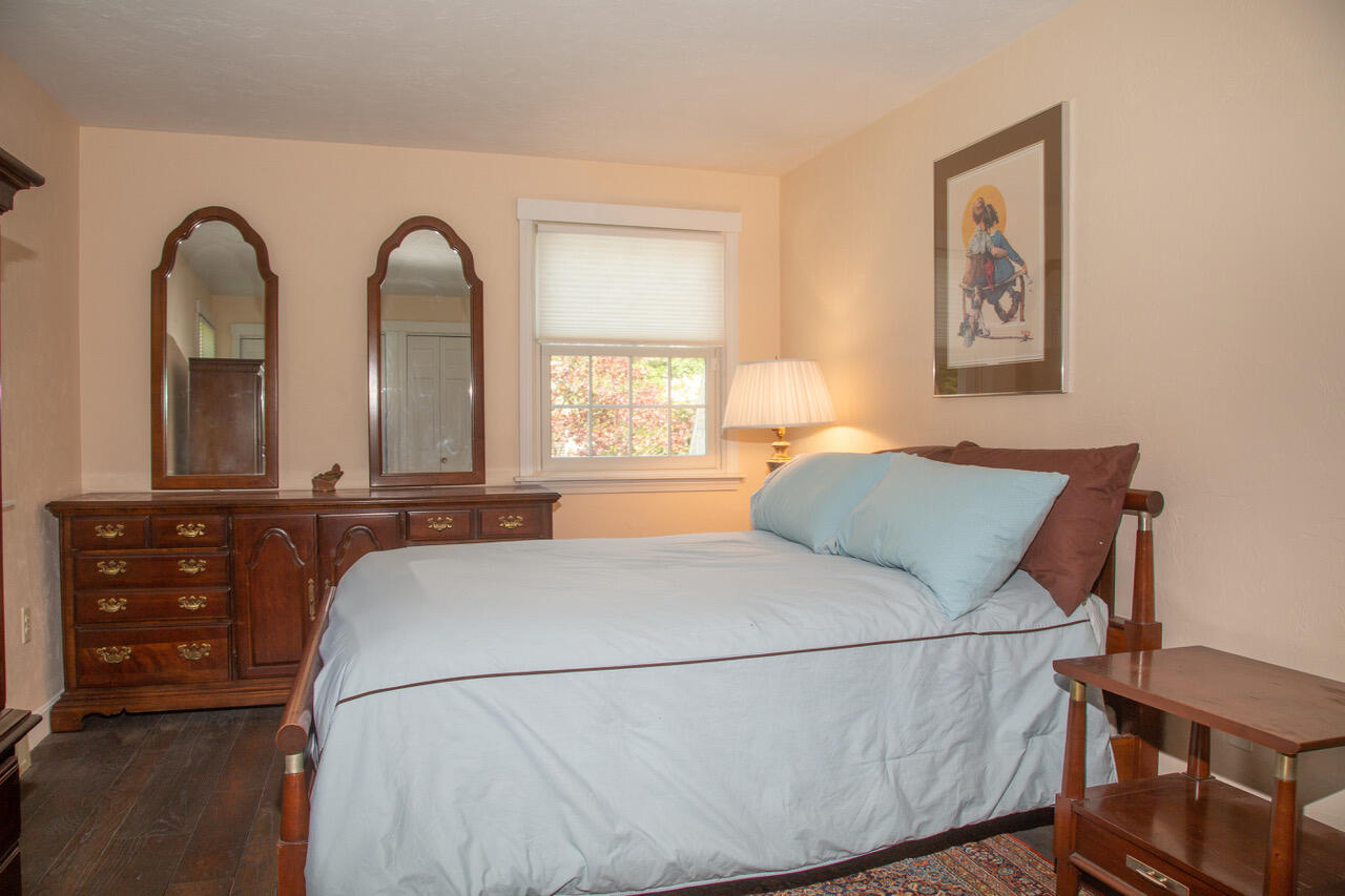 21 Midpine Road Cummaquid, MA 02675 - Photo 22 of 32 a bedroom with a bed and a large window