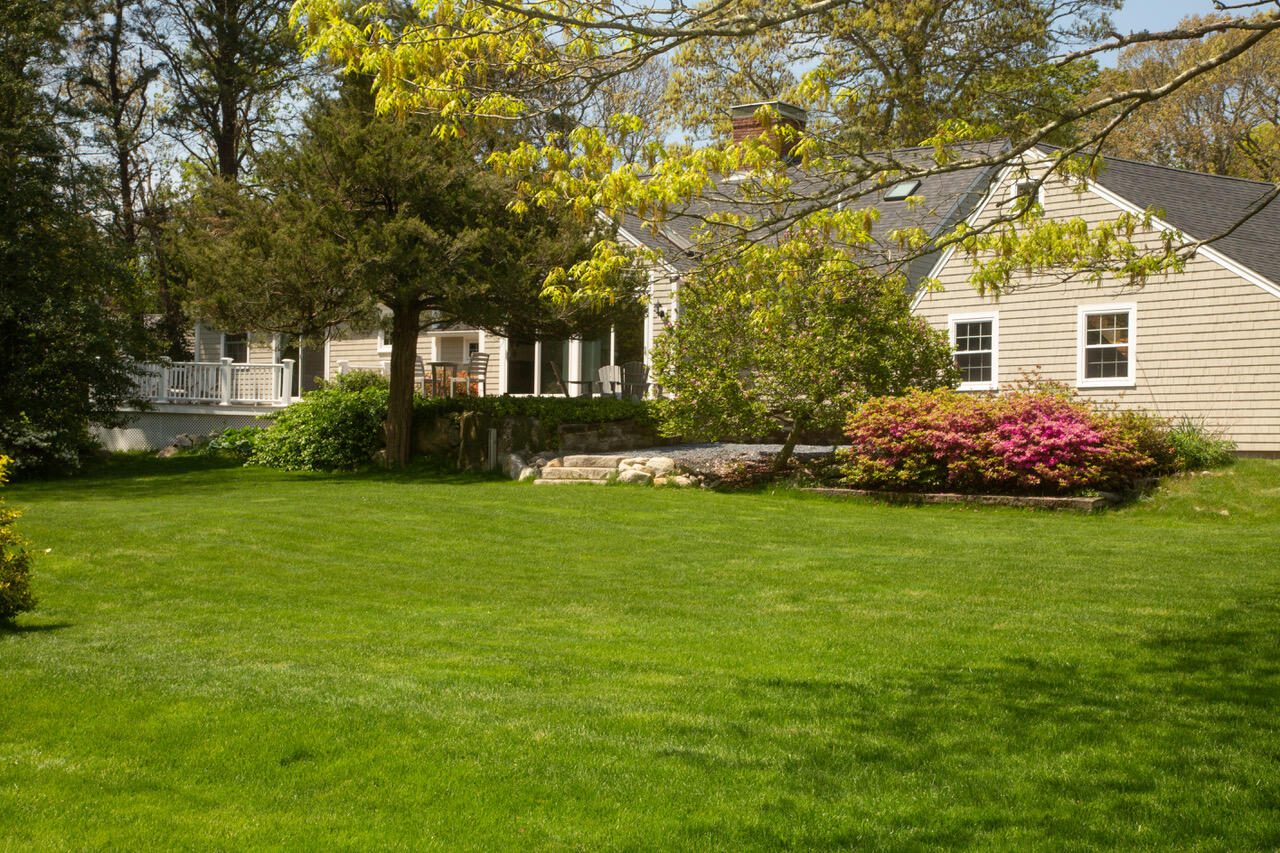 21 Midpine Road Cummaquid, MA 02675 - Photo 4 of 32 a front view of house with yard