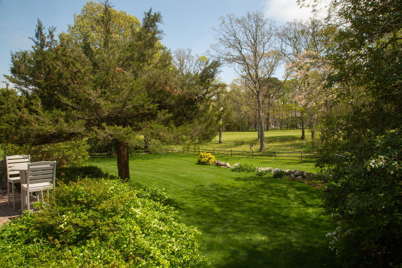 21 Midpine Road Cummaquid, MA 02675 - Photo 7 of 32 a view of a park with large trees
