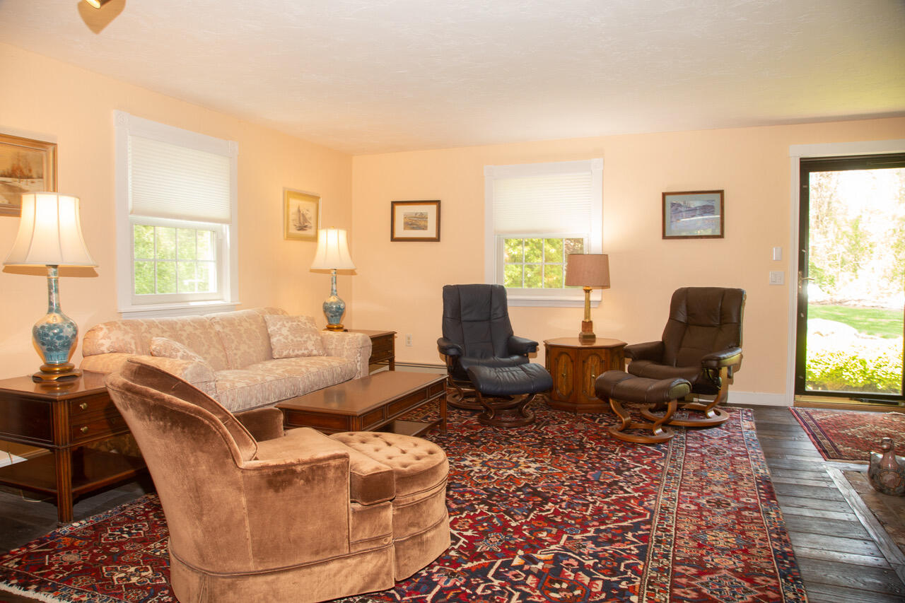 21 Midpine Road Cummaquid, MA 02675 - Photo 9 of 32 a living room with furniture and a window