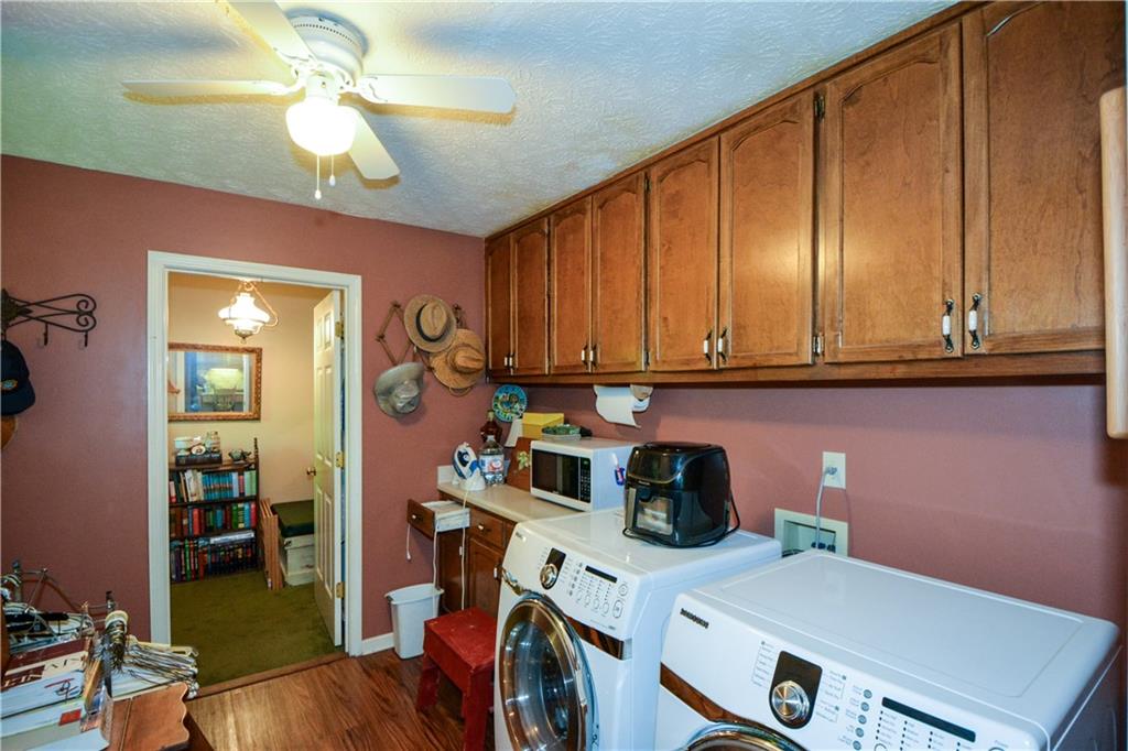 130 Hawn Road Fayetteville, GA 30215 - Photo 66 of 67 a view of a workspace with furniture and a window