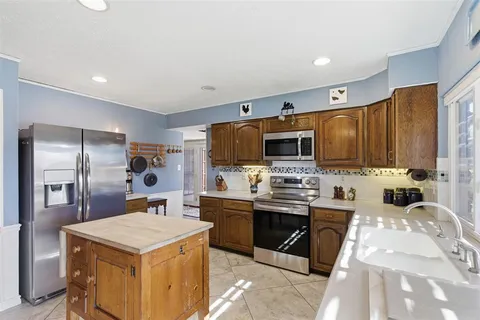 $310,000 | 2204 Red Bluff Drive, Carrollton, TX 75007