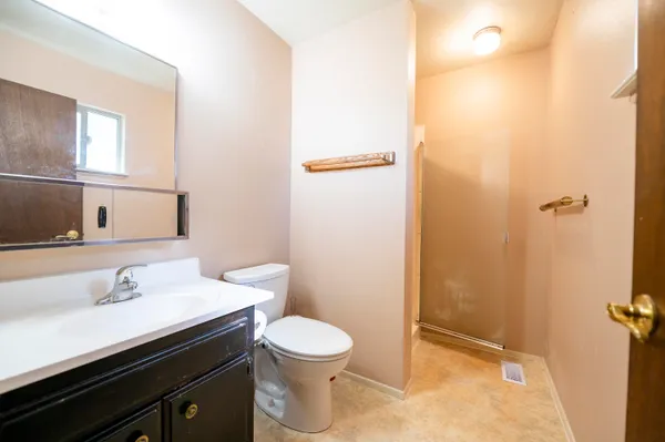 a bathroom with a sink and a toilet