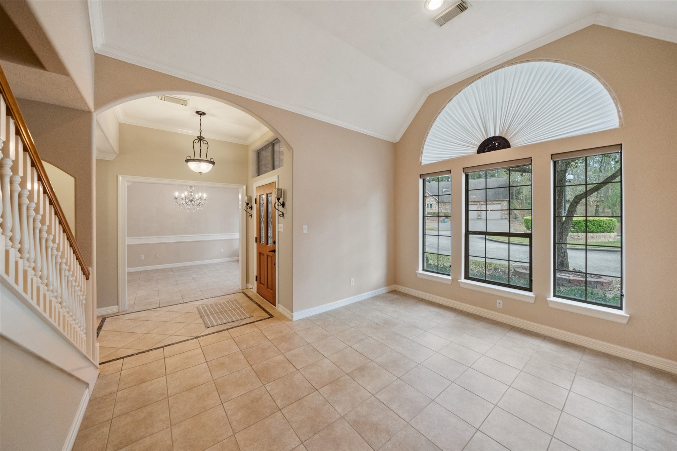901 Longmire Road, Unit 28 Conroe, TX 77304 - Photo 15 of 31 wooden floor in an empty room with a window