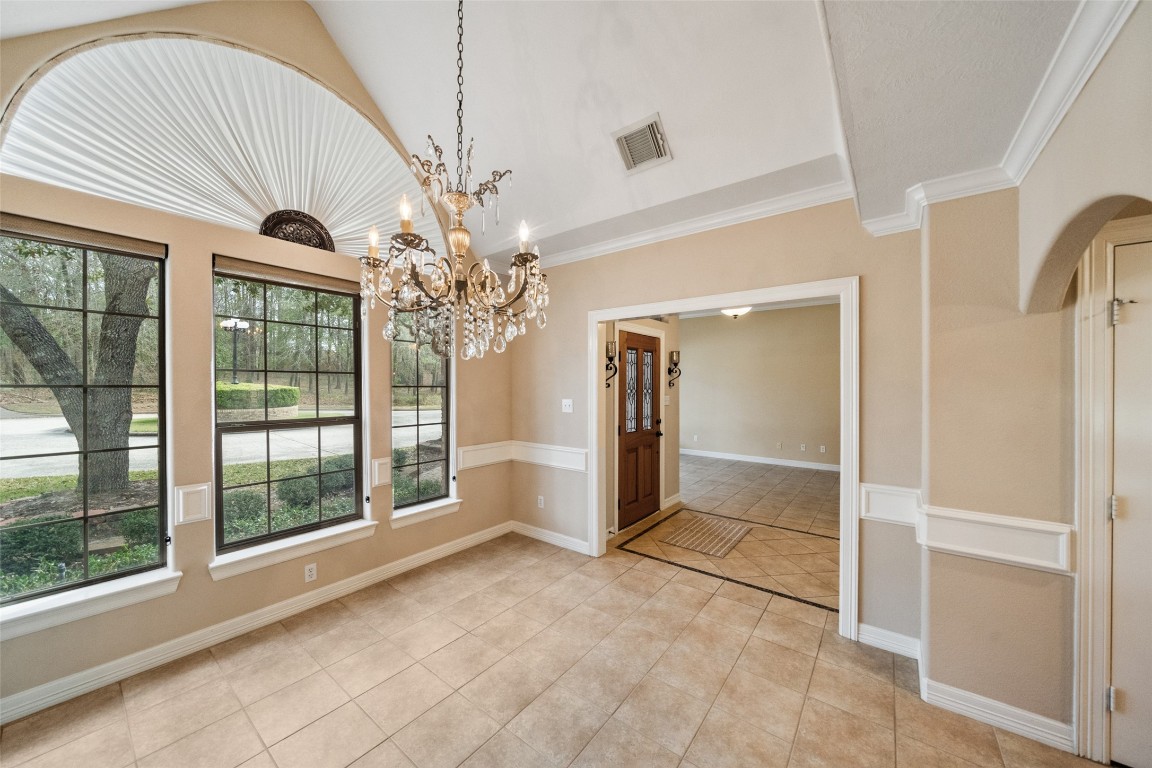 901 Longmire Road, Unit 28 Conroe, TX 77304 - Photo 16 of 31 a view of a big room with large windows
