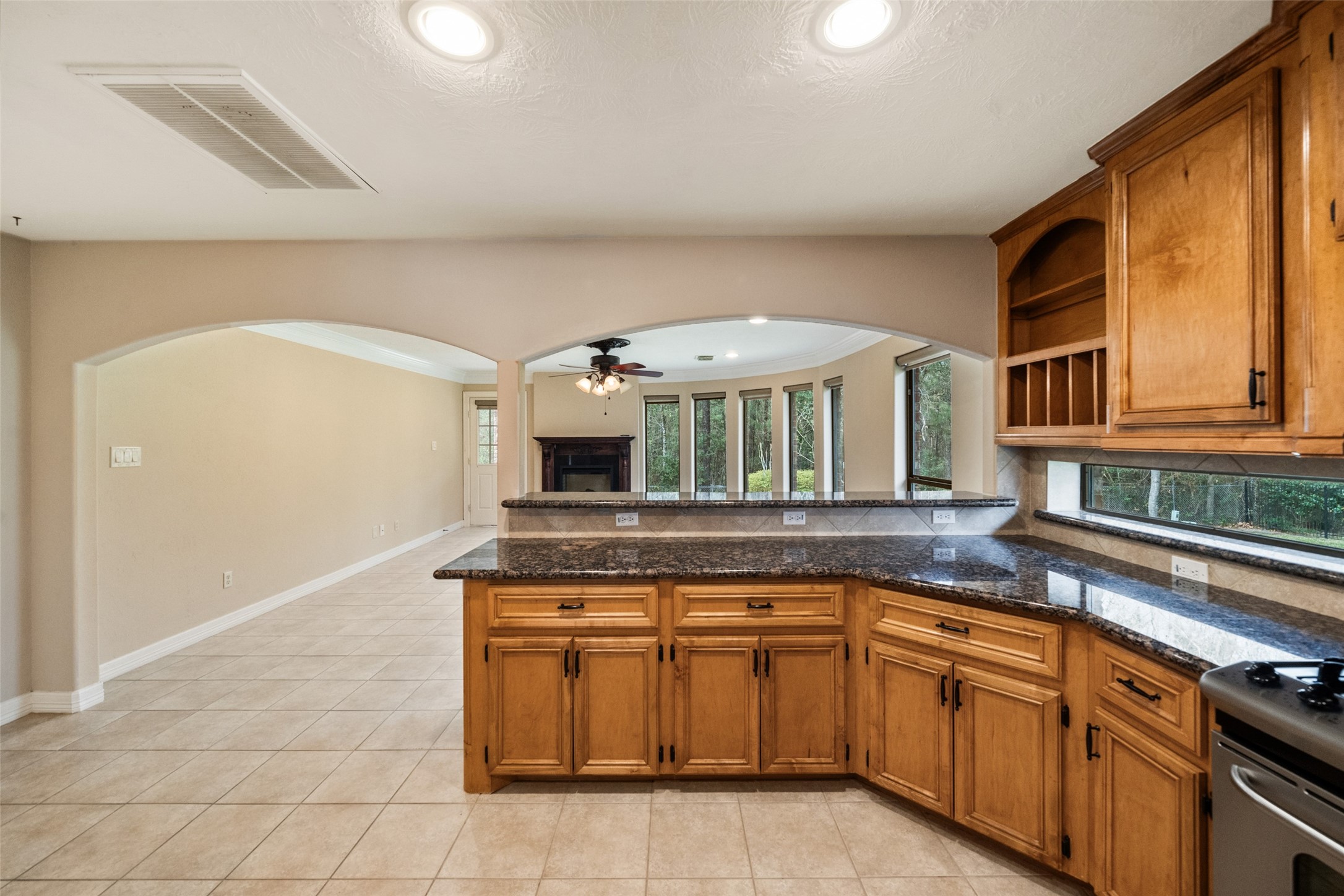 901 Longmire Road, Unit 28 Conroe, TX 77304 - Photo 31 of 31 a kitchen with a stove and a sink