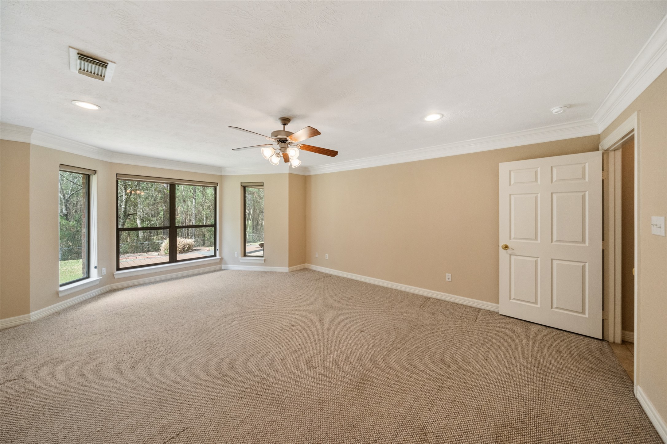 901 Longmire Road, Unit 28 Conroe, TX 77304 - Photo 23 of 31 a view of an empty room with a window