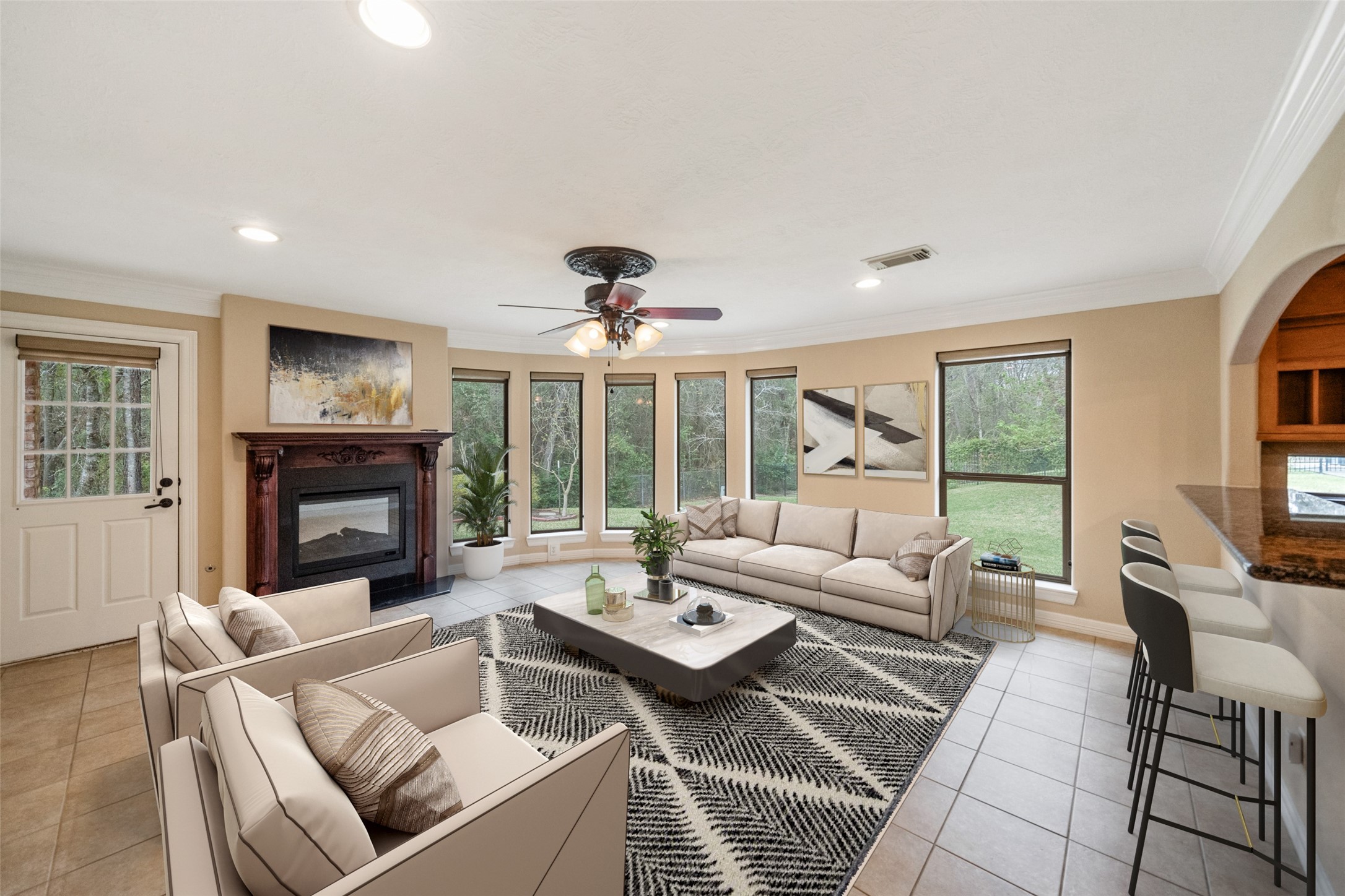 901 Longmire Road, Unit 28 Conroe, TX 77304 - Photo 3 of 31 a living room with furniture large window and a fireplace